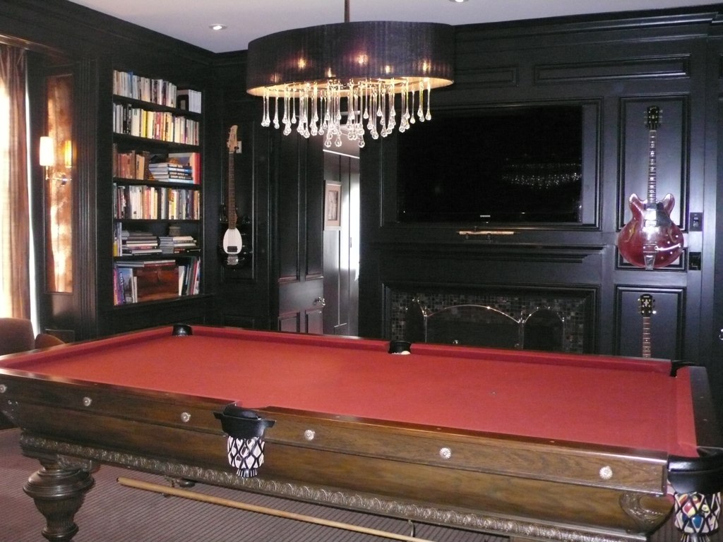 We also enjoyed being part of the transformation of the library into a stunning billiards hall. Wall panels were painted deep and dark and a dramatic chandelier illuminates the traditional pool table.
